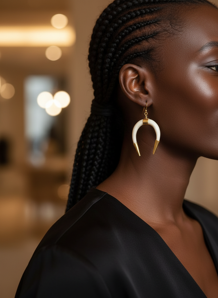 Cow horn earrings with brass detailing