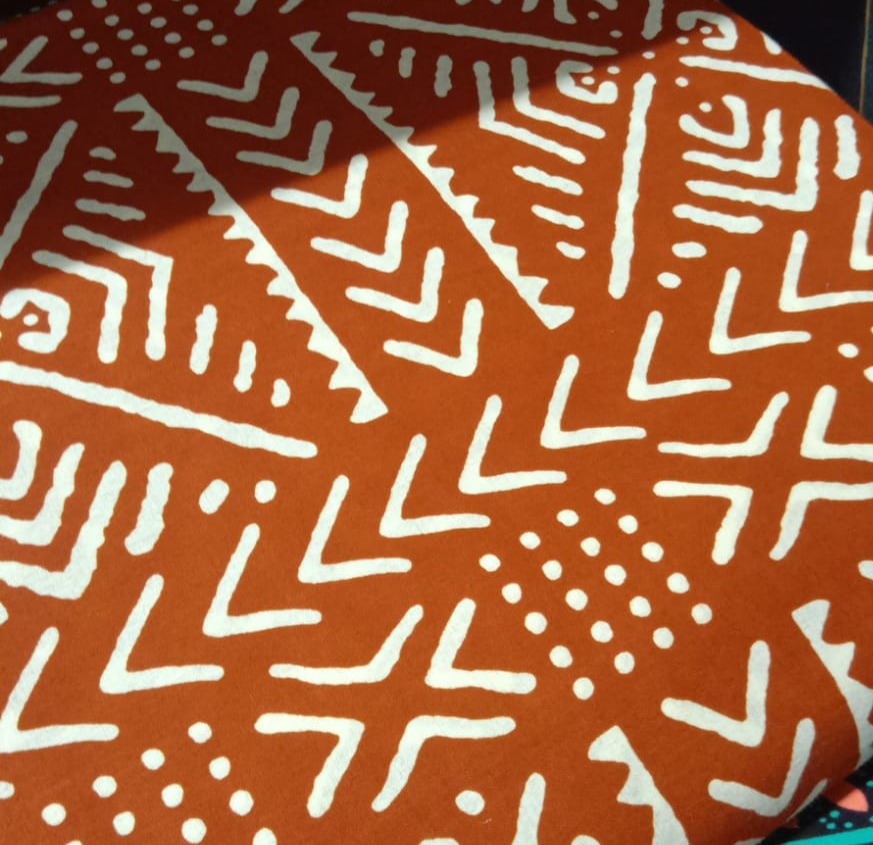 orange tribal script