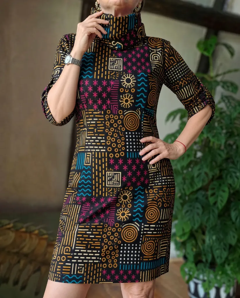 Earthy patchword turtleneck dress